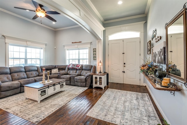 living area with ornamental molding, recessed lighting, dark wood-style flooring, and ceiling fan