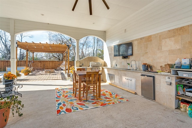 view of patio / terrace with area for grilling, a sink, fence, grilling area, and a pergola