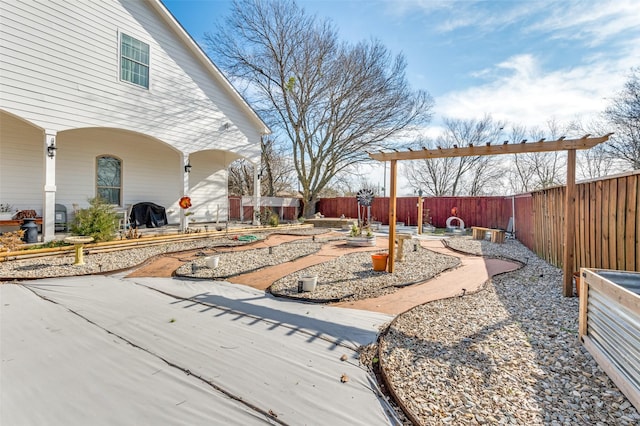 view of yard with a patio area and a fenced backyard