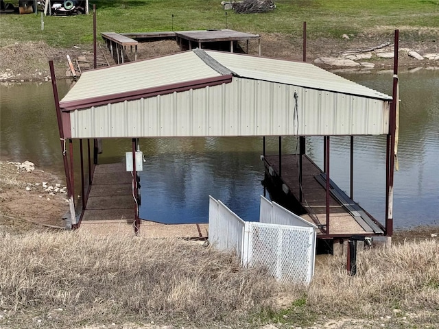 view of dock with a water view