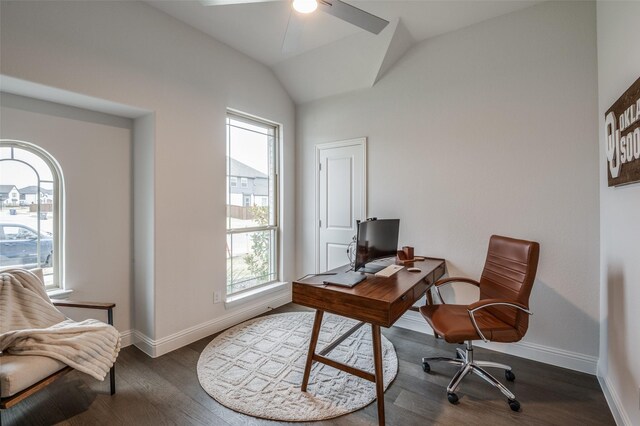 office area with vaulted ceiling, ceiling fan, and dark wood-type flooring