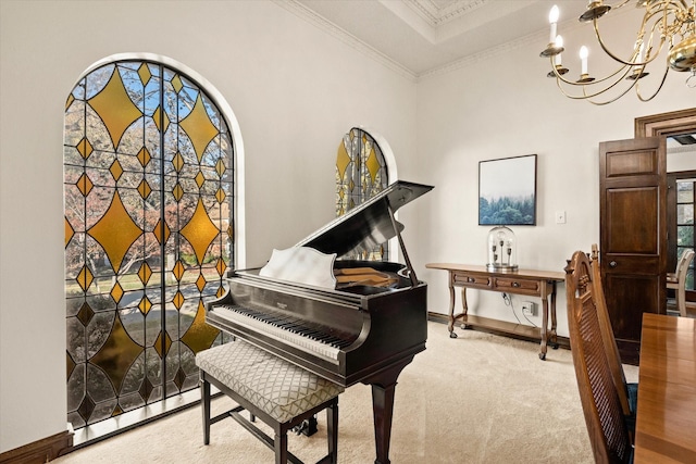 miscellaneous room with light colored carpet, a chandelier, and ornamental molding