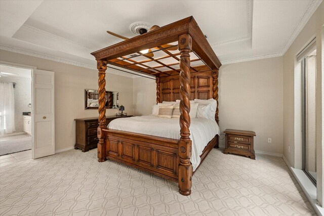 bedroom with light carpet, a raised ceiling, ceiling fan, and ornamental molding