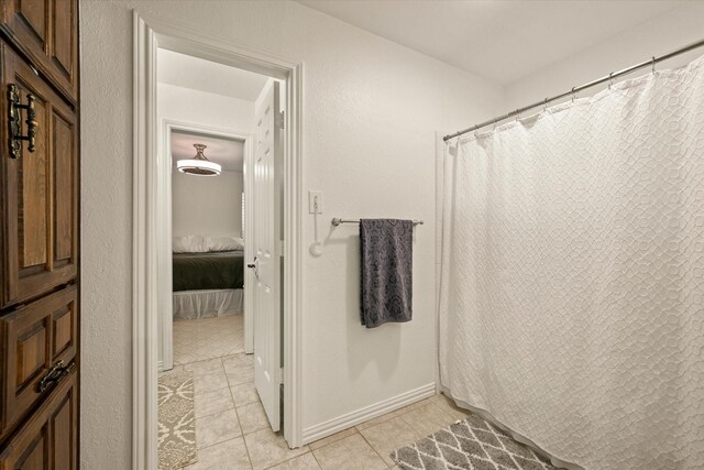 bathroom featuring tile patterned flooring