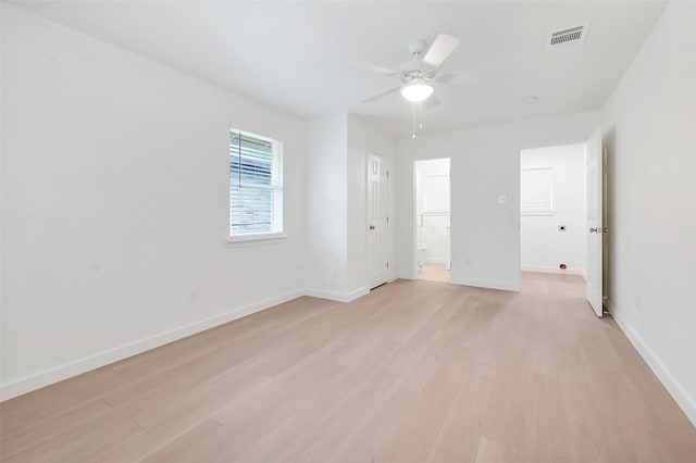 unfurnished room with light hardwood / wood-style flooring and ceiling fan