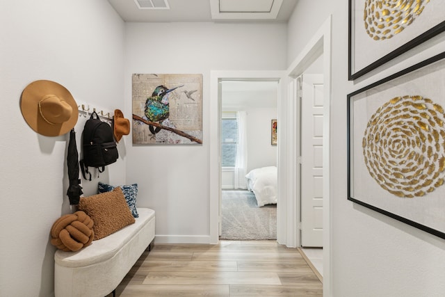 hall featuring light hardwood / wood-style flooring