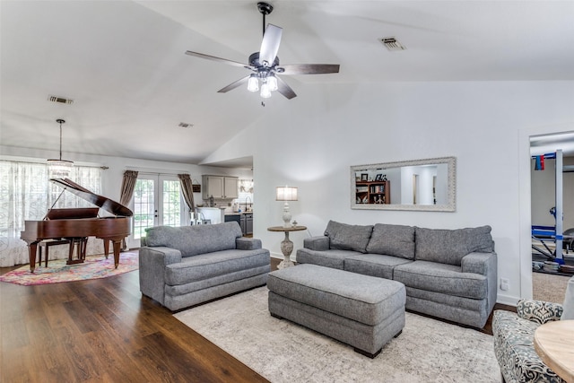 living room with french doors, vaulted ceiling, ceiling fan, and wood-type flooring