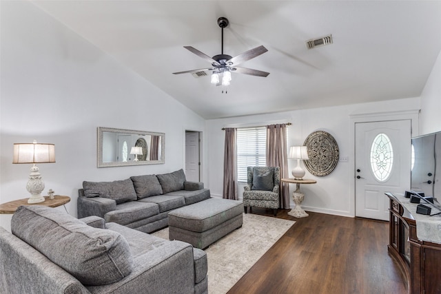 living room with dark hardwood / wood-style floors, ceiling fan, and lofted ceiling