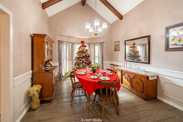 dining room featuring beamed ceiling, high vaulted ceiling, dark hardwood / wood-style floors, and an inviting chandelier