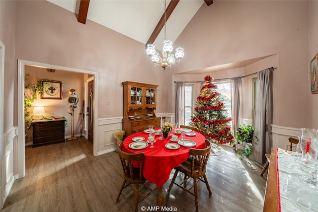 dining space featuring an inviting chandelier, dark wood-type flooring, high vaulted ceiling, and beamed ceiling