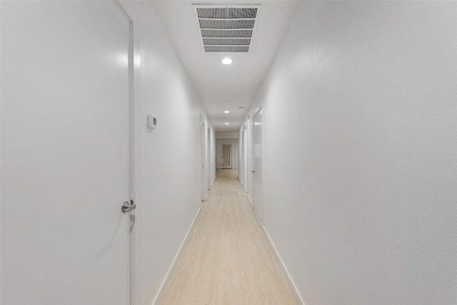 hall featuring light wood-type flooring