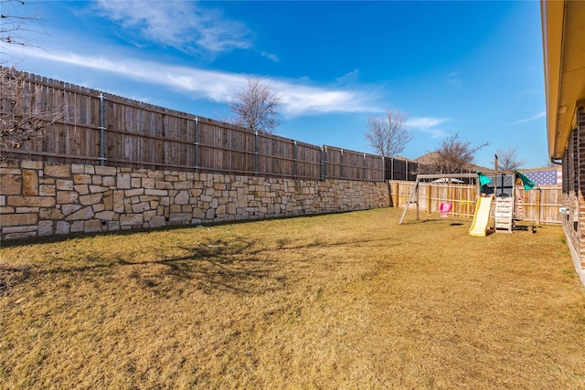 view of yard with a playground