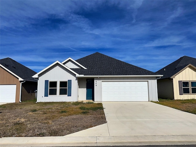 ranch-style house featuring a garage