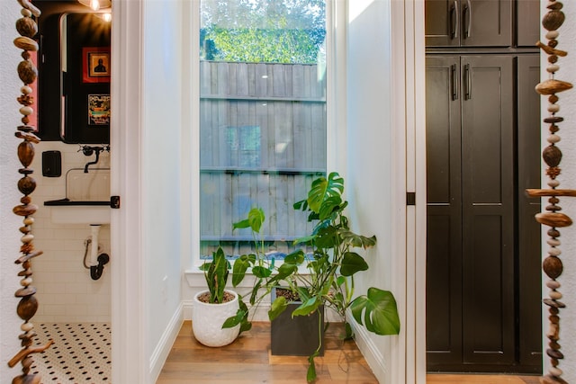 bathroom featuring wood-type flooring