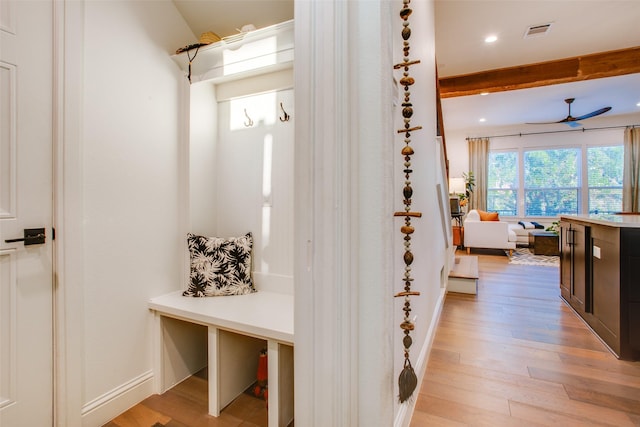 mudroom featuring light hardwood / wood-style flooring and ceiling fan