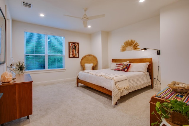 carpeted bedroom with ceiling fan