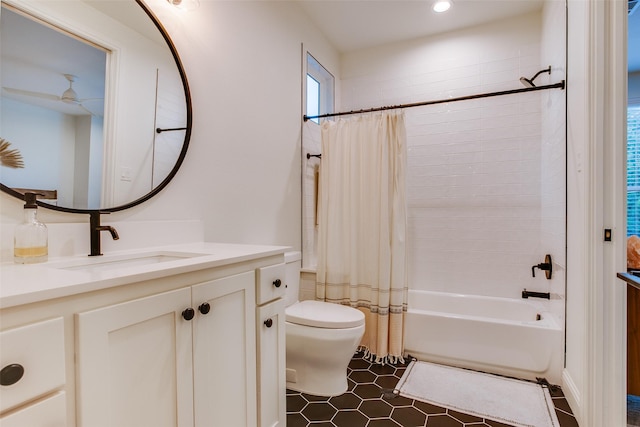 full bathroom with tile patterned flooring, vanity, toilet, and shower / bathtub combination with curtain