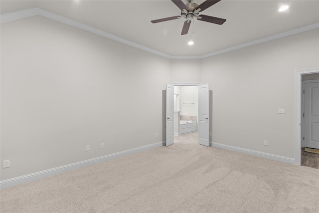 unfurnished bedroom with light carpet, ensuite bathroom, ceiling fan, and ornamental molding