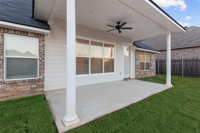 view of patio featuring ceiling fan