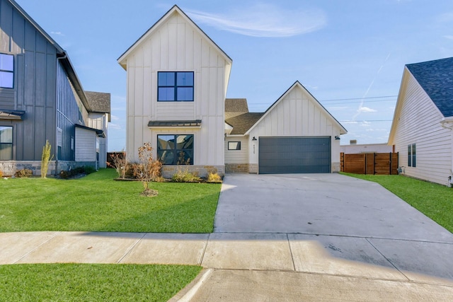 modern farmhouse style home with a garage and a front yard