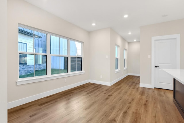 empty room with light wood-type flooring