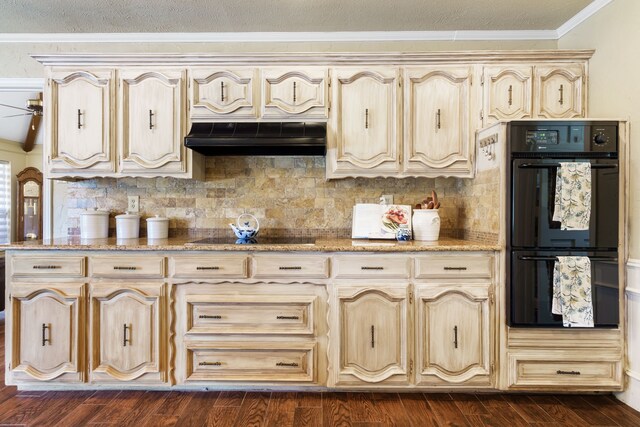 kitchen with light brown cabinets, backsplash, dark wood-type flooring, black appliances, and crown molding