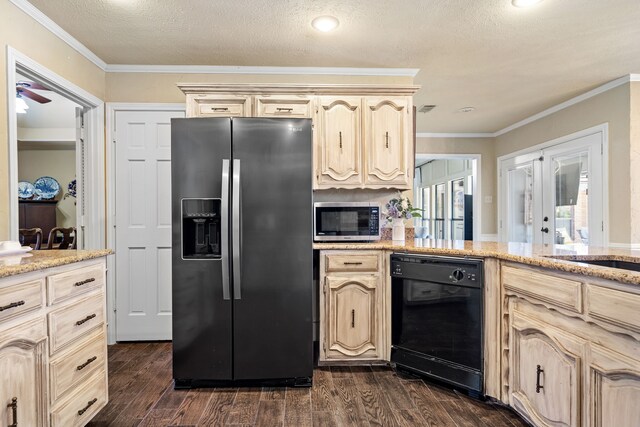 kitchen with appliances with stainless steel finishes, a textured ceiling, ceiling fan, crown molding, and dark wood-type flooring