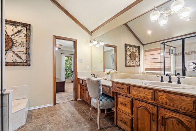 bathroom featuring vanity, a bath, lofted ceiling, and crown molding