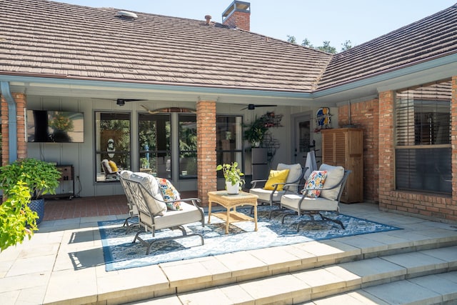 view of patio featuring ceiling fan