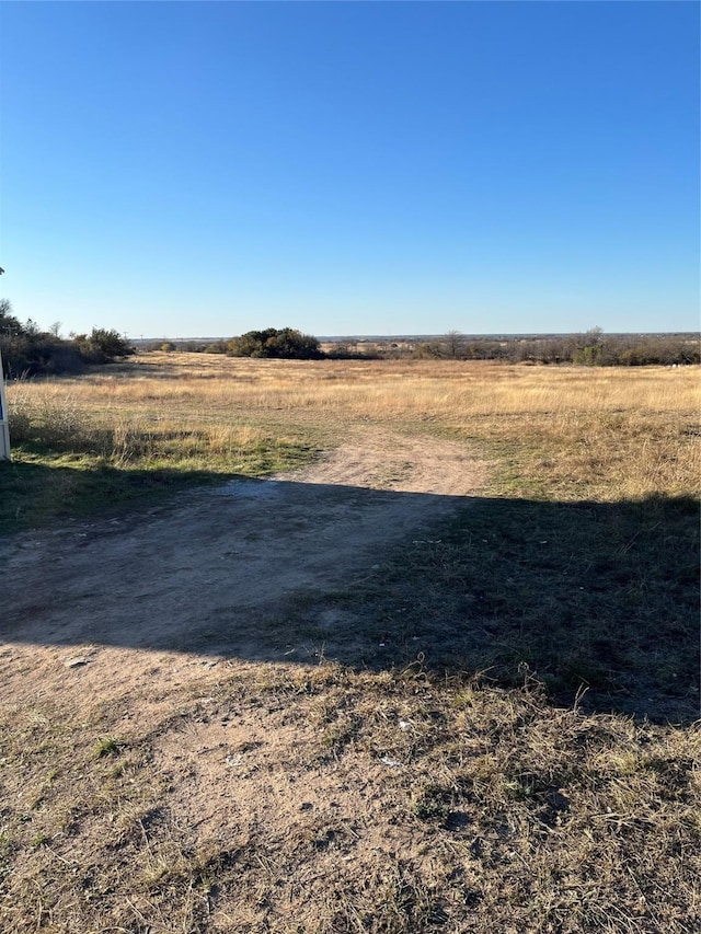 exterior space with a rural view