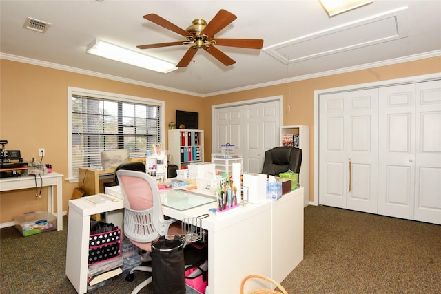 home office featuring dark colored carpet, ceiling fan, and crown molding