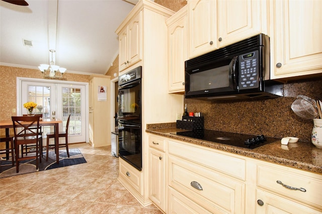 kitchen featuring french doors, dark stone counters, vaulted ceiling, light tile patterned floors, and black appliances