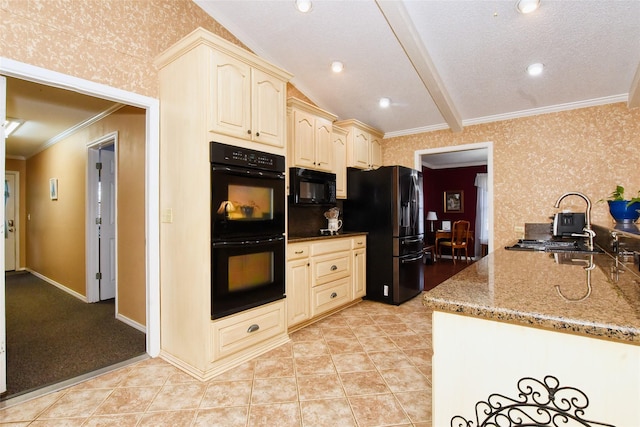 kitchen with light stone countertops, a textured ceiling, crown molding, black appliances, and lofted ceiling with beams