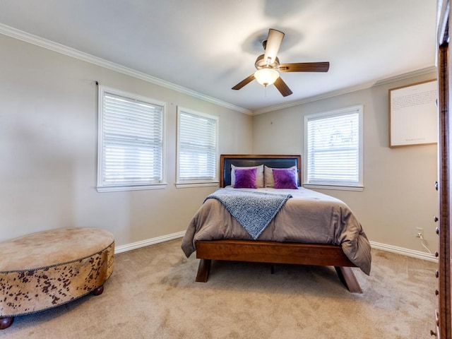 bedroom with light carpet, ceiling fan, and ornamental molding