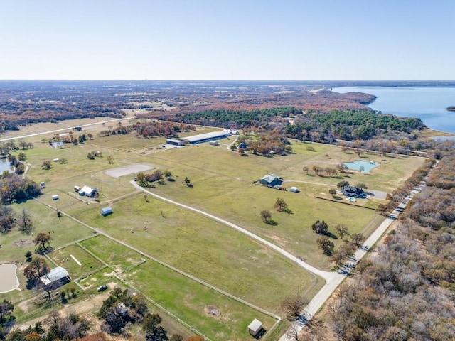 drone / aerial view with a rural view and a water view