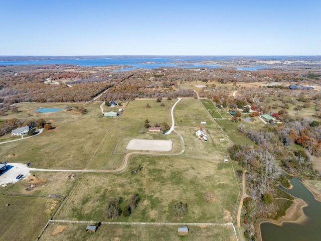 aerial view with a rural view and a water view