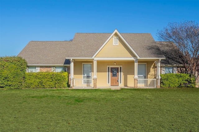 view of front of house featuring a porch and a front lawn