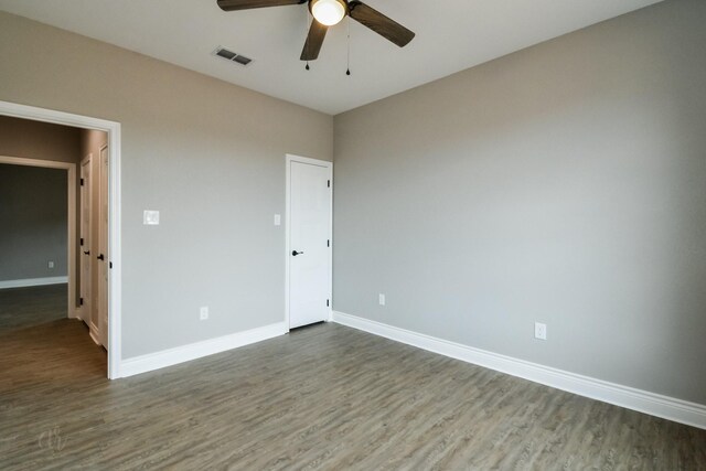 unfurnished bedroom featuring wood-type flooring and ceiling fan