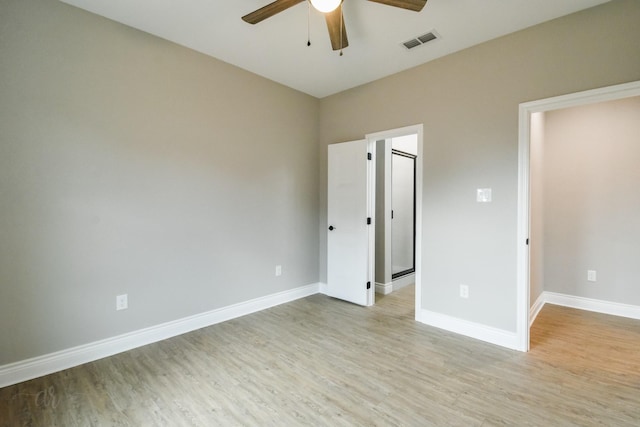 unfurnished bedroom featuring ceiling fan and light wood-type flooring