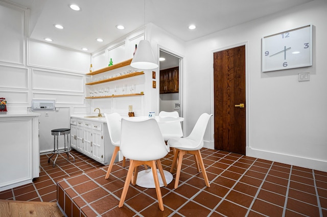 tiled dining area with sink