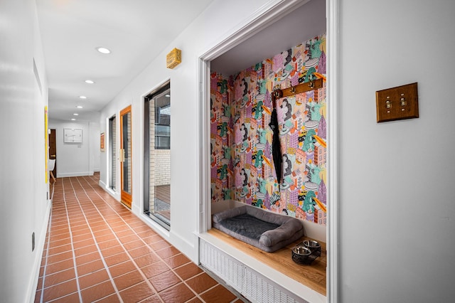 corridor featuring tile patterned flooring