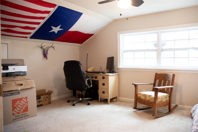 office featuring ceiling fan, carpet floors, and lofted ceiling