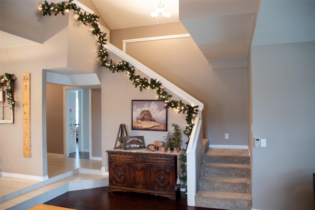 stairway with hardwood / wood-style flooring