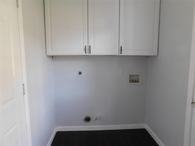 laundry area featuring hookup for an electric dryer, hookup for a gas dryer, cabinets, and washer hookup