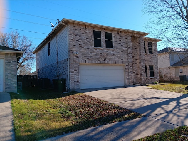 view of front of home with a front lawn, central AC unit, and a garage