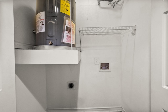 clothes washing area featuring electric dryer hookup, hookup for a washing machine, water heater, and laundry area