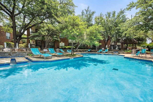 pool featuring a patio area