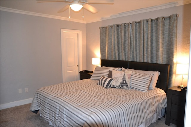 carpeted bedroom featuring ceiling fan and ornamental molding