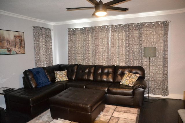 living room with ceiling fan and crown molding