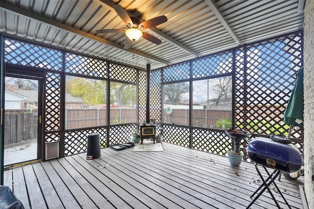 deck with ceiling fan and area for grilling